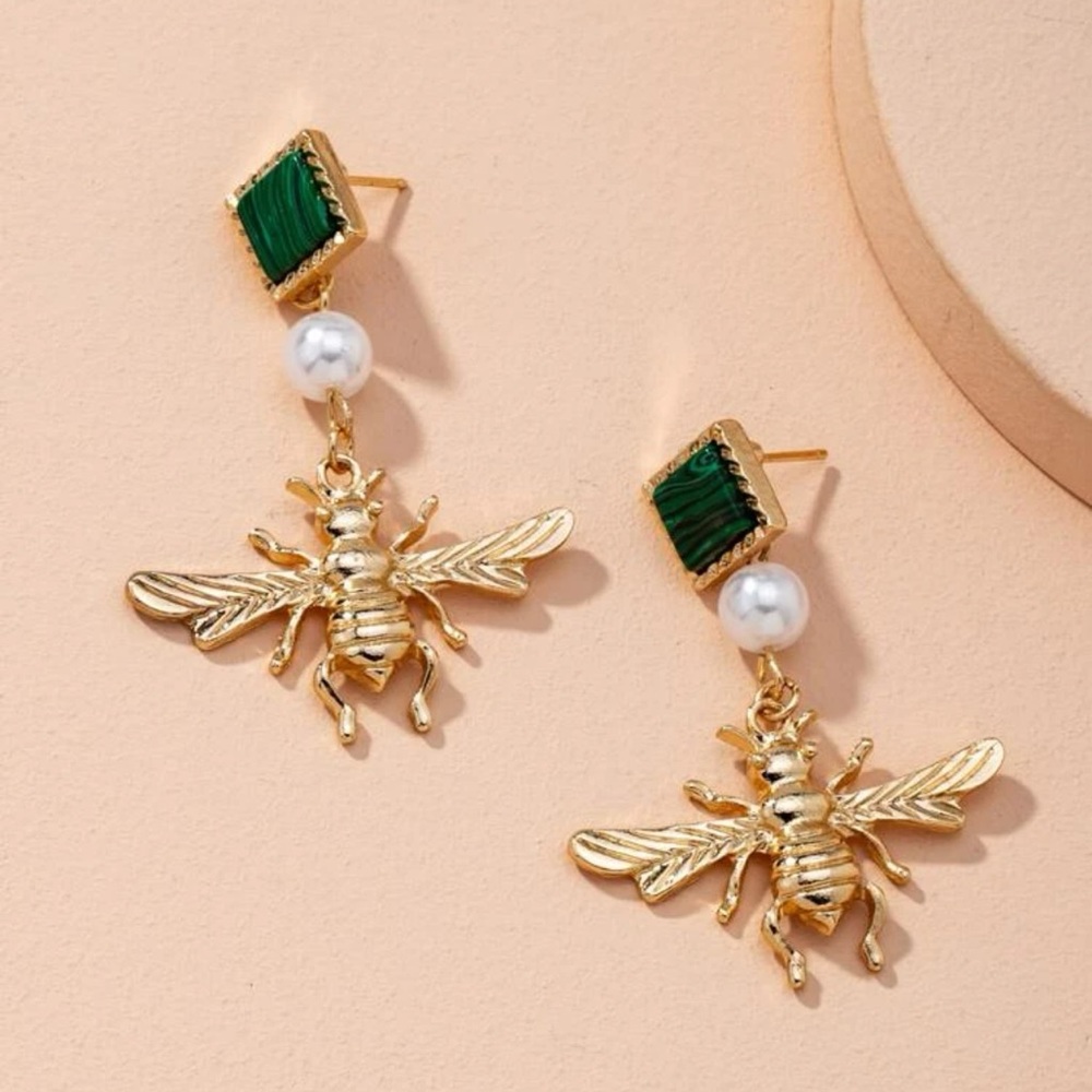 attached-shaped faux pearl earrings